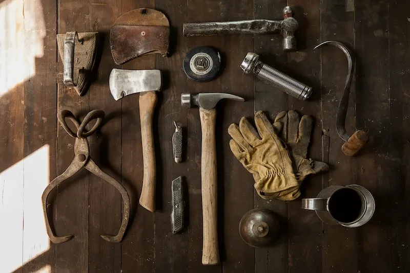Old workshop tools on a workbench.
